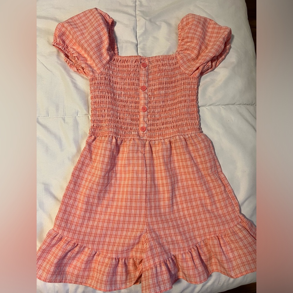 new never worn girls size M 7-8 romper peach color